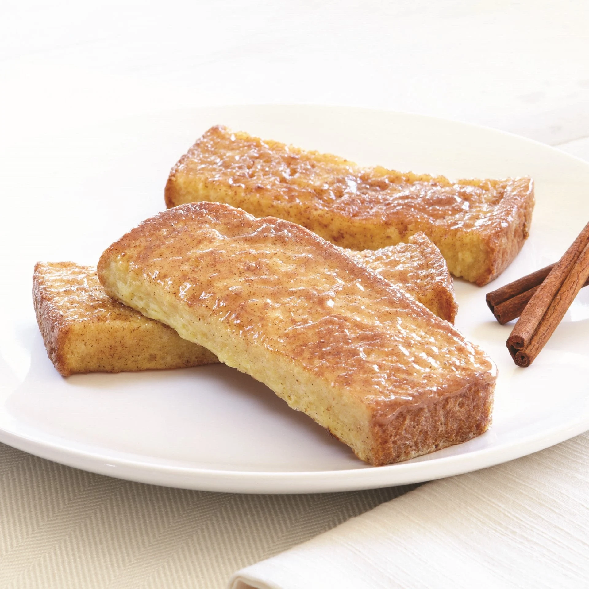 Papetti's Fully Cooked Whole Grain Cinnamon Glaze French Toast Sticks 2.9 Ounce Size - 85 Per Case.