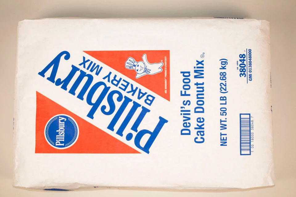 Pillsbury Donut Mix Handkut Devil's Foodcake Donut 50 Pound Each - 1 Per Case.