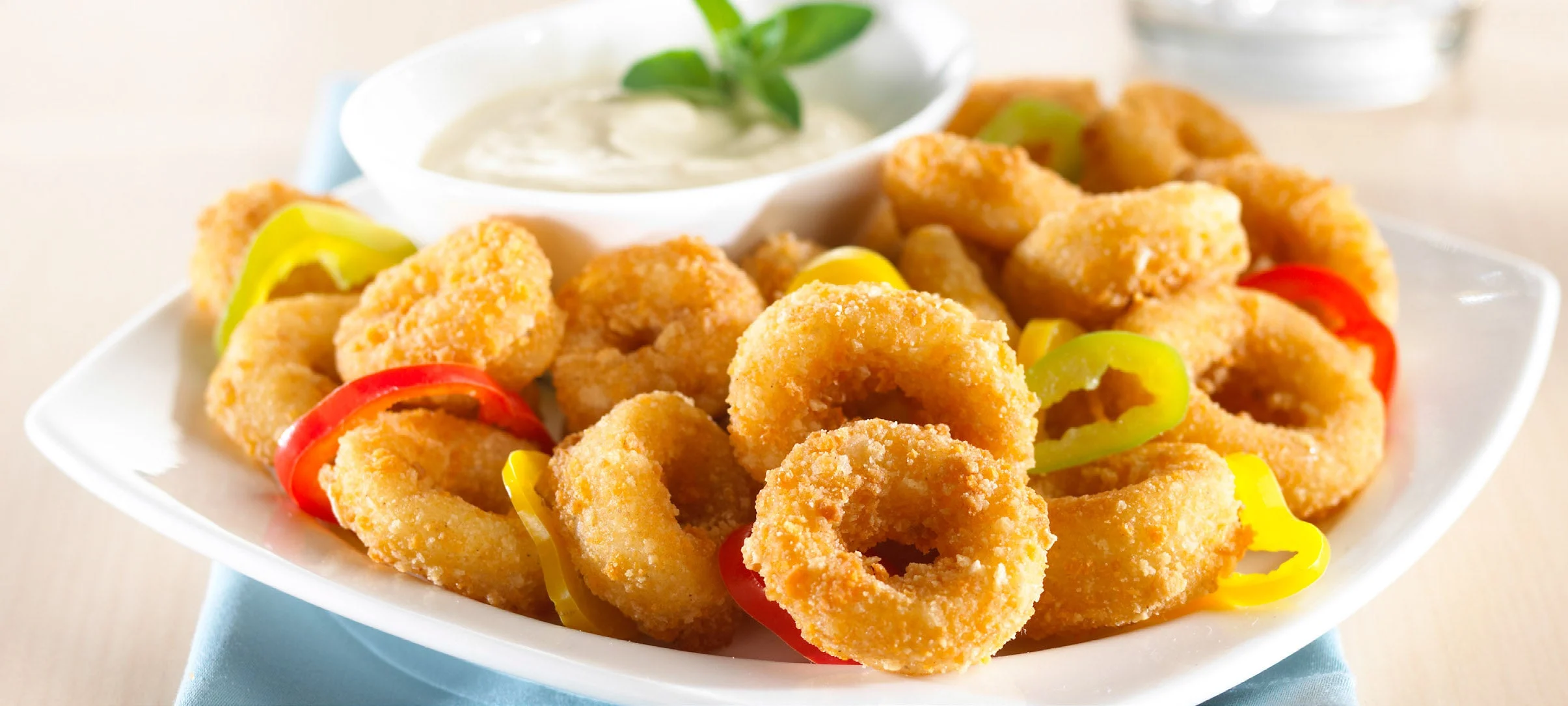 Mrs. Friday's Breaded Calamari Rings 2.5 Pound Each - 4 Per Case.