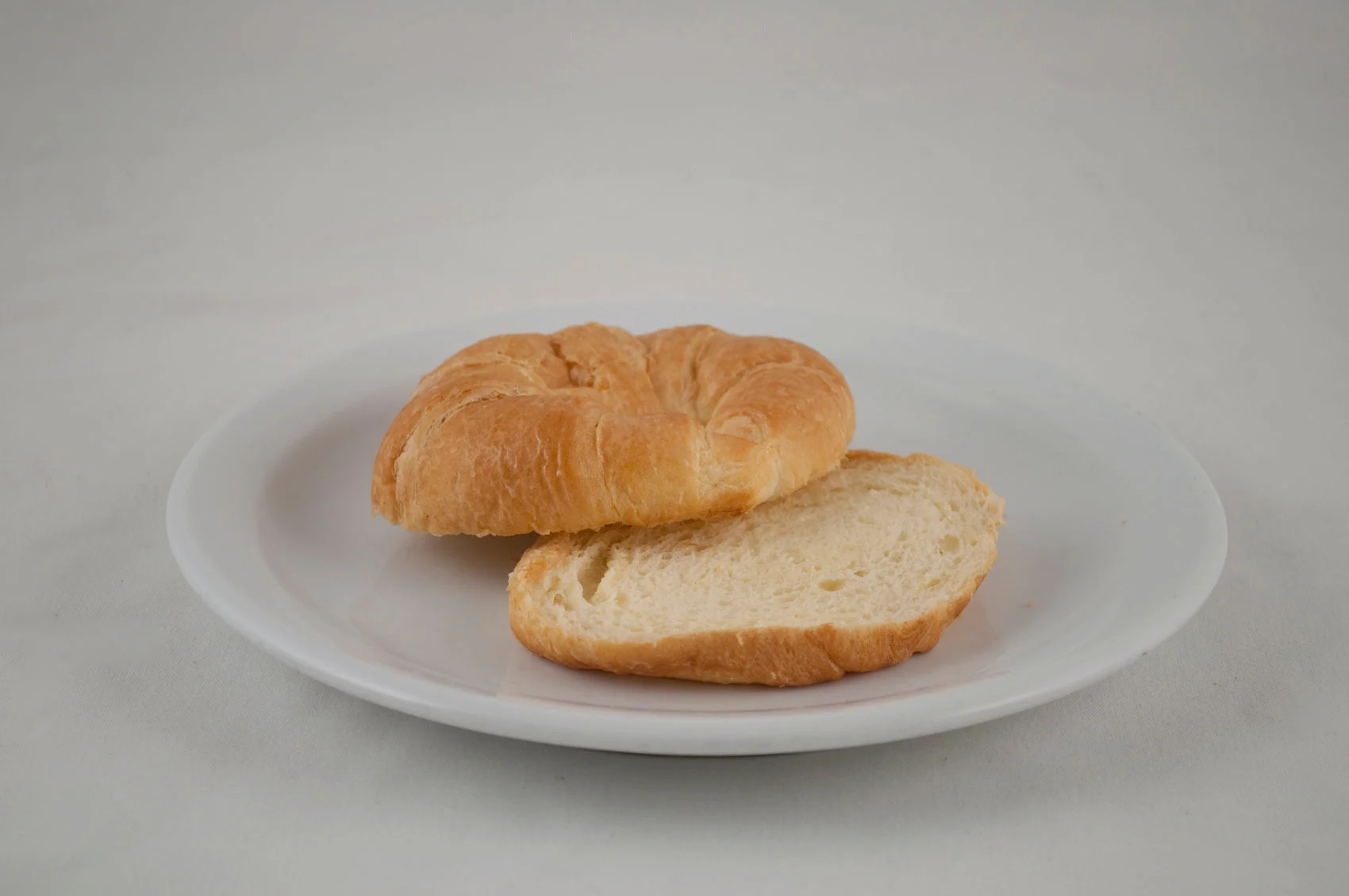 Pillsbury Baked Croissant Plain Pinched Sliced 2 Ounce Size - 4 Per Case.